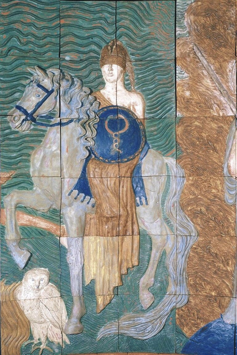 High relief ceramic tile wall depicting the mythological goddess Athena on a horse with her owl standing below.